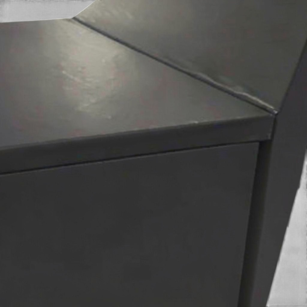 UK Gym Pits black foam pit wall and top edge padding with smooth PVC finish for gymnastics and parkour facilities.