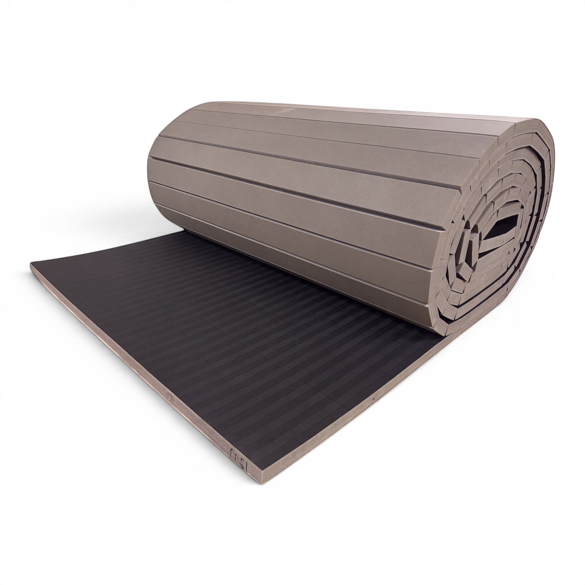 UK Gym Pits black hybrid roll-out mat with a durable tatami-textured PVC surface for gymnastics and martial arts.