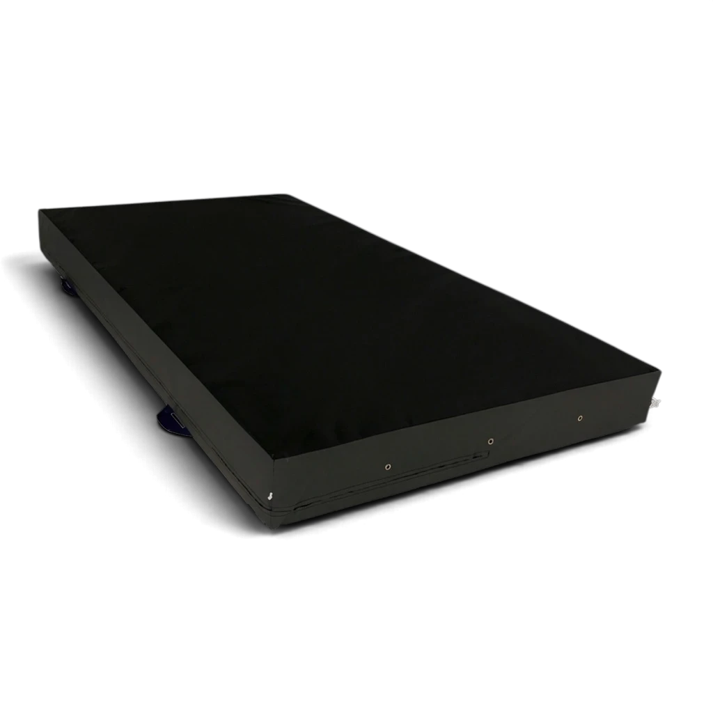 UK Gym Pits black PVC parkour landing mat with high-density foam and corner toggles for connecting multiple mats.