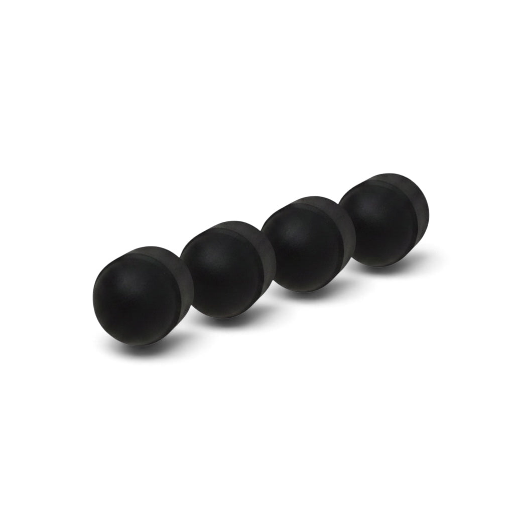 Four black plastic protective caps for UK Gym Pits base plate fixings, designed for safety and flush mounting.