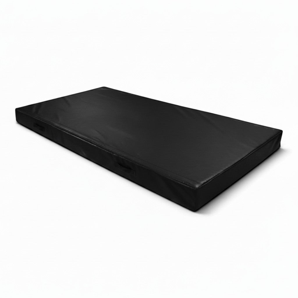 UK Gym Pits black rectangular push-on safety mat with reinforced PVC cover and side handles for trampoline use