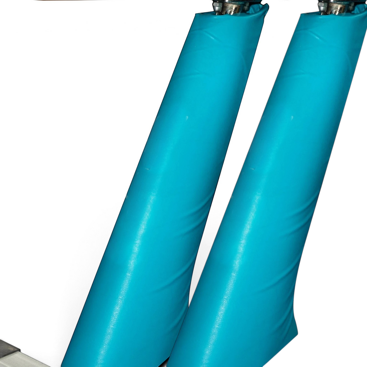 UK Gym Pits blue PVC vinyl safety padding wrapped around a gymnastics beam leg for impact protection