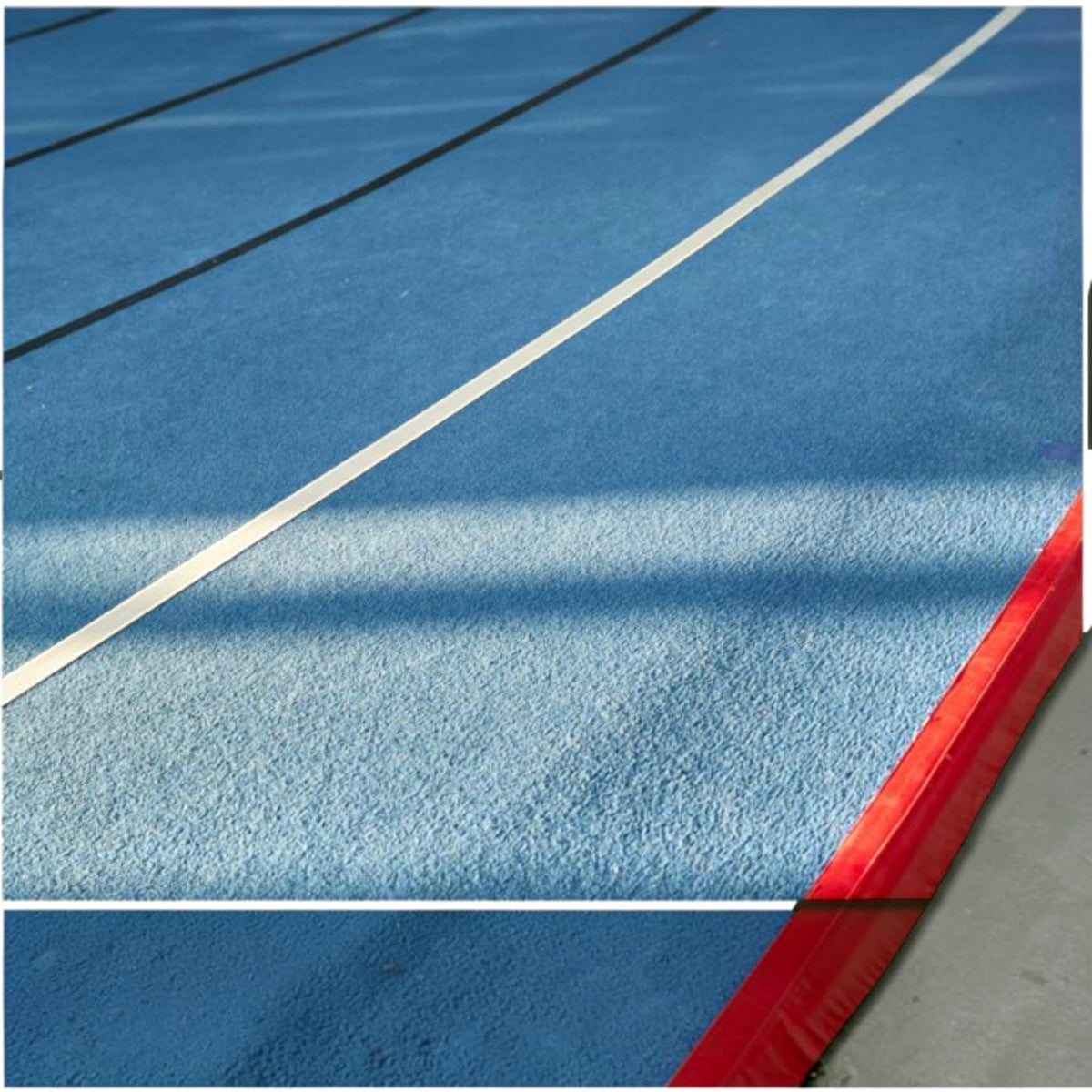 UK Gym Pits blue carpeted cheerleading sprung floor with white boundary lines and red protective side skirt