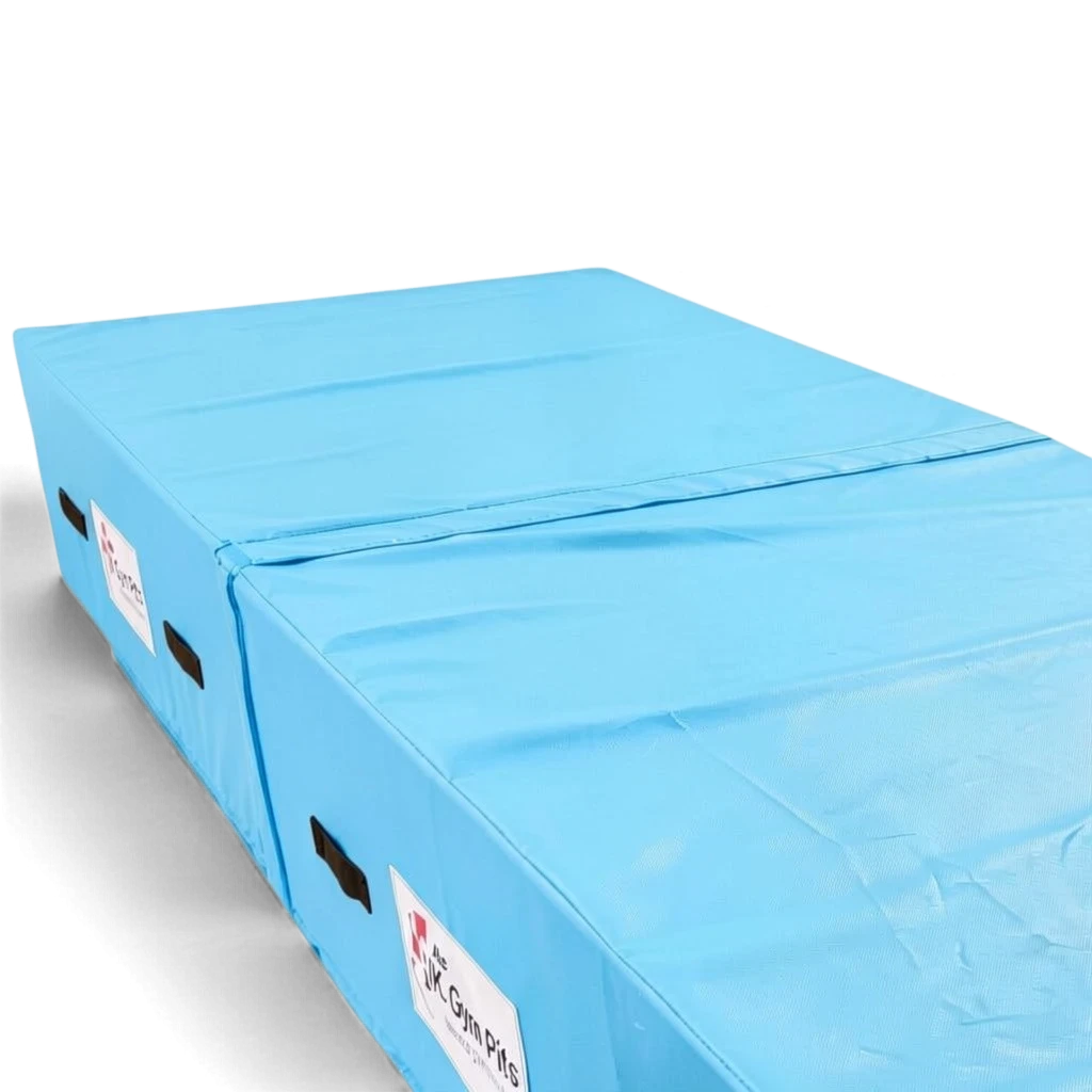 UK Gym Pits light blue high-density foam track run-up block with heavy-duty handles and anti-slip base.