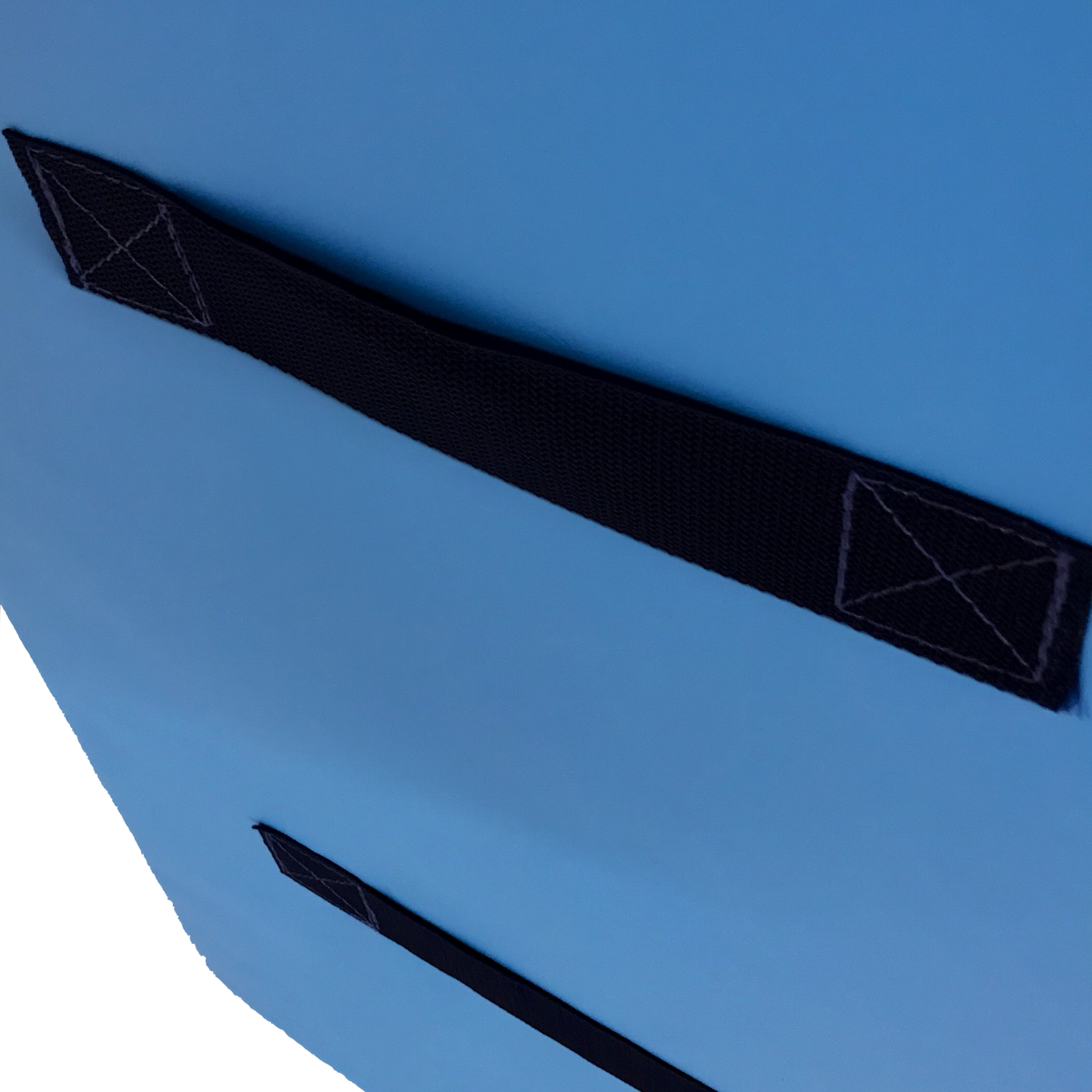 UK Gym Pits wide parkour wedge block in blue PVC with black carry handles for freestyle gymnastics training.