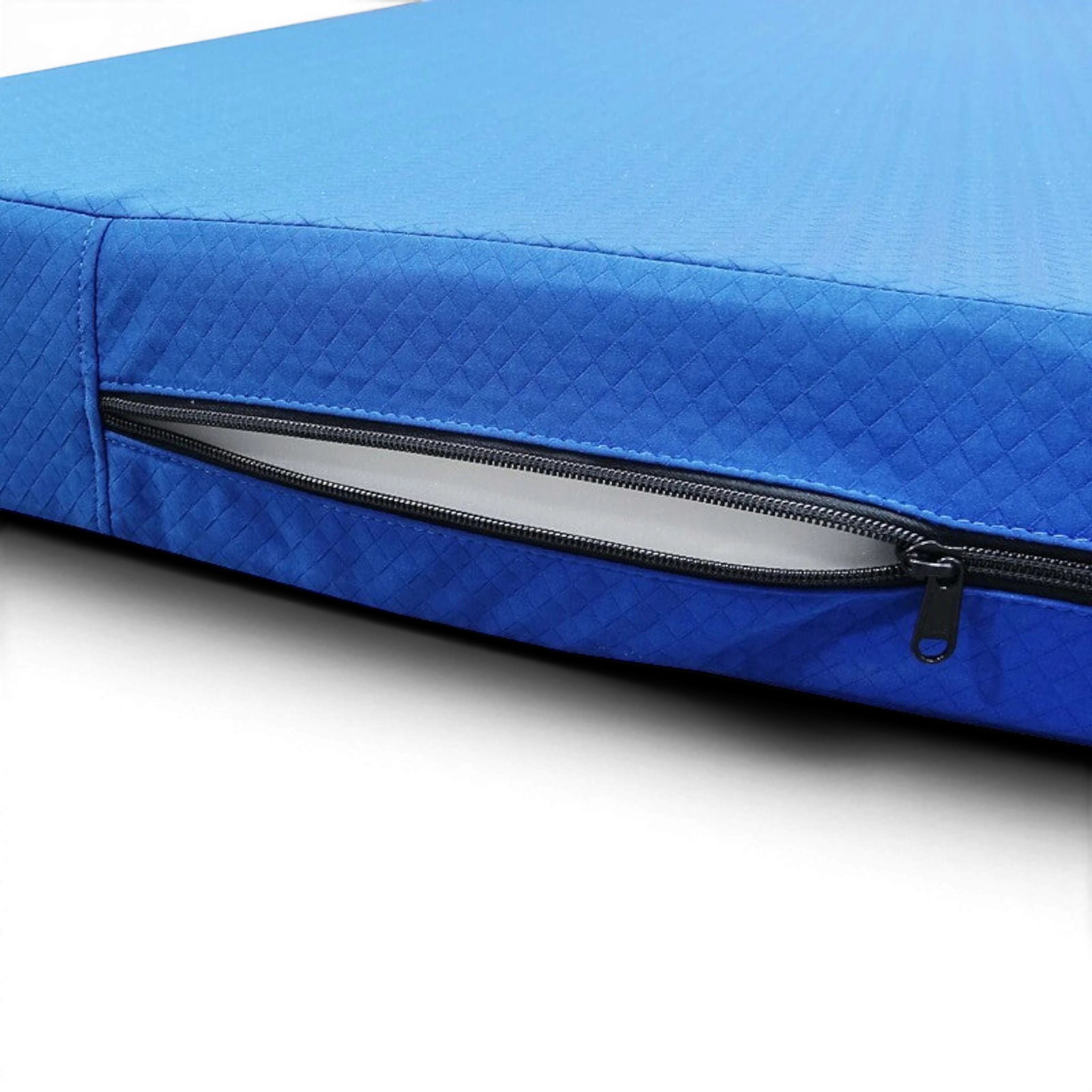 UK Gym Pits blue practice mat with quilted nylon cover and visible foam interior through the open zipper
