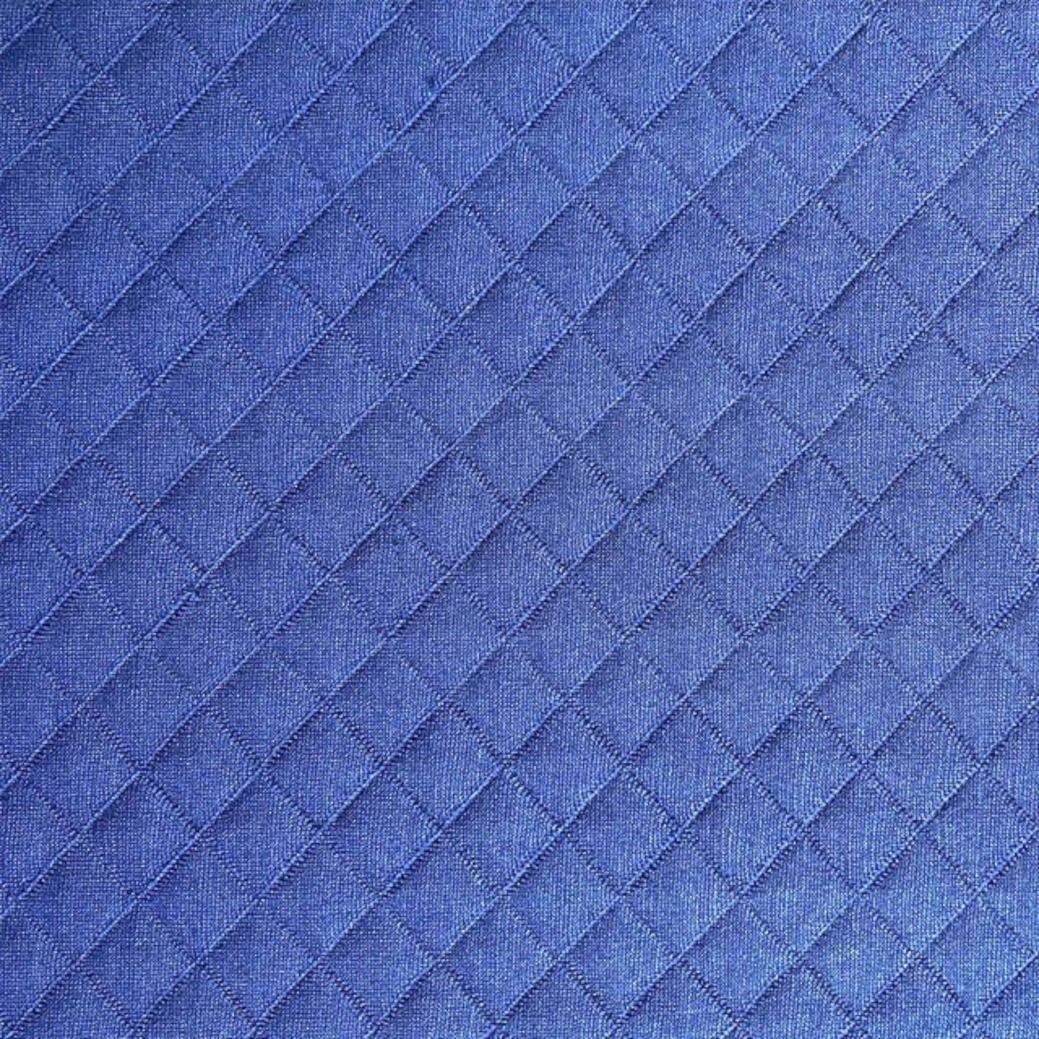 UK Gym Pits blue quilted fabric texture with a diamond pattern used for gymnastics practice mat covers