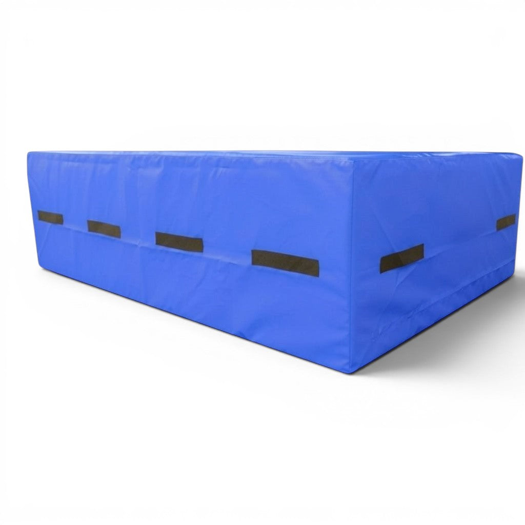 UK Gym Pits blue resi foam landing pit with heavy duty handles for gymnastics, parkour, and trampoline safety.