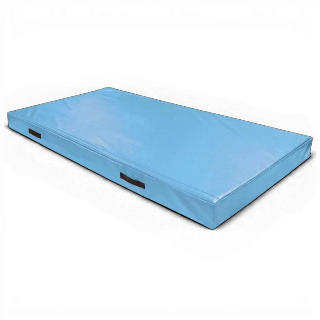 UK Gym Pits light blue rectangular trampoline push-on safety mat with reinforced PVC cover and side carry handles.
