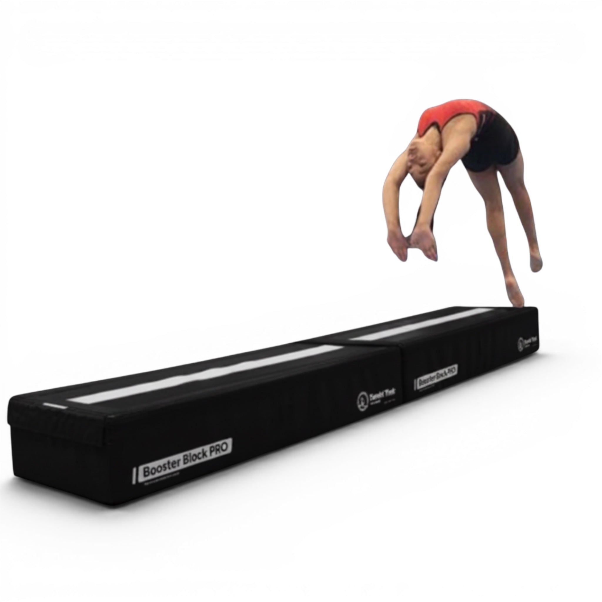 UK Gym Pits Booster Block Pro in black with a white center line, being used by a gymnast for back handspring practice.