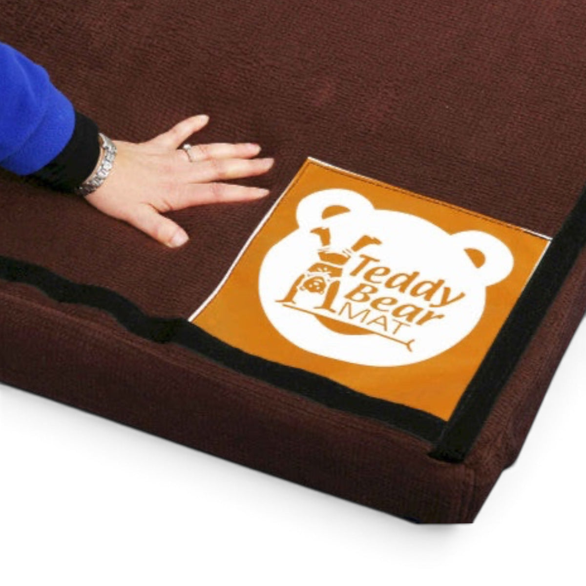 UK Gym Pits brown waffle weave teddy bear training mat with a soft foam surface for gymnastics practice