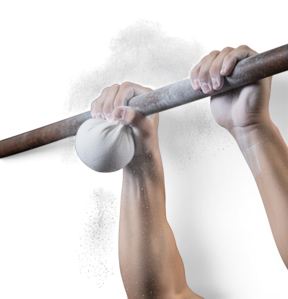 UK Gym Pits chalk ball in a cotton sack being used by an athlete to grip a metal bar for improved traction