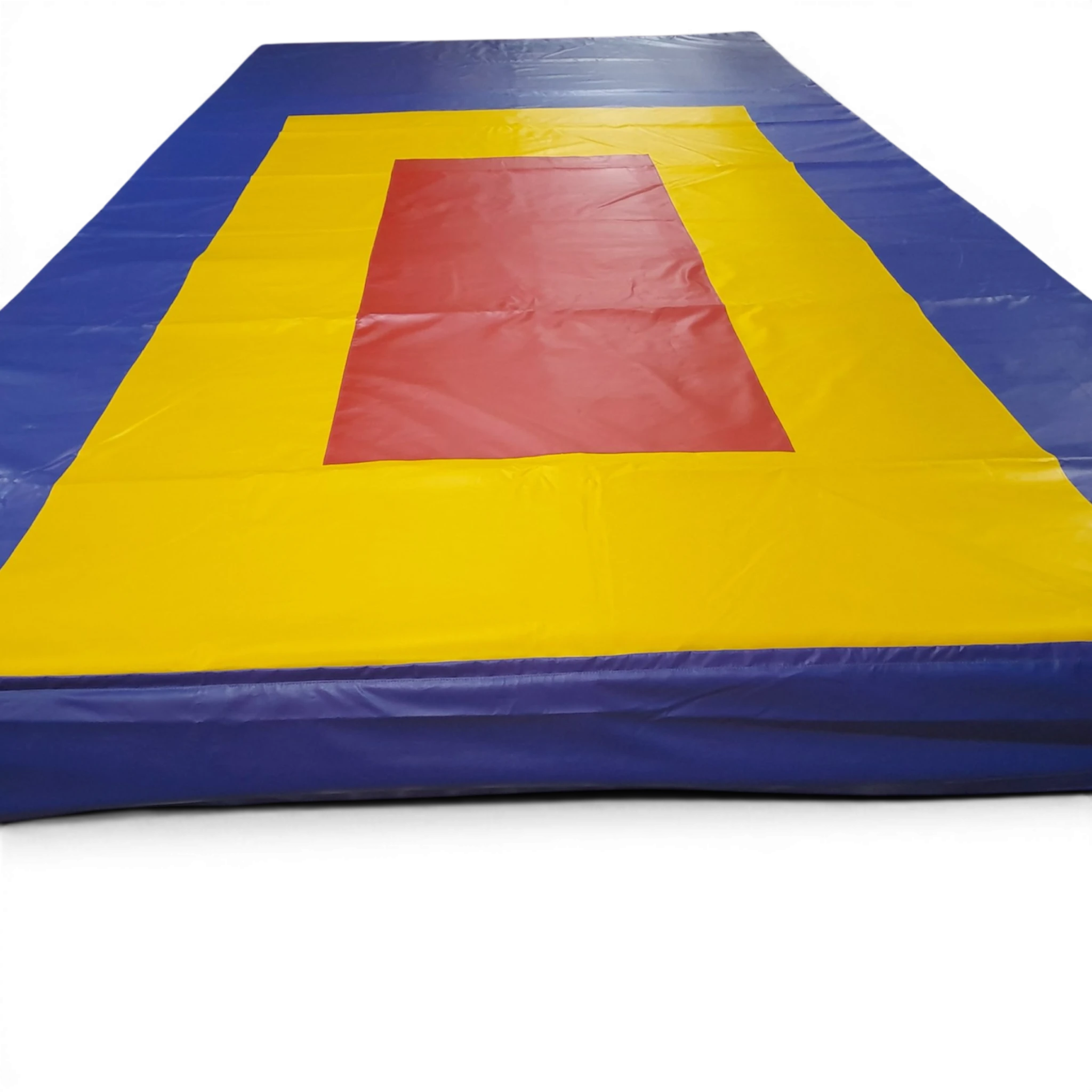 UK Gym Pits double mini tramp competition landing area with blue, yellow, and red FIG markings on a black background