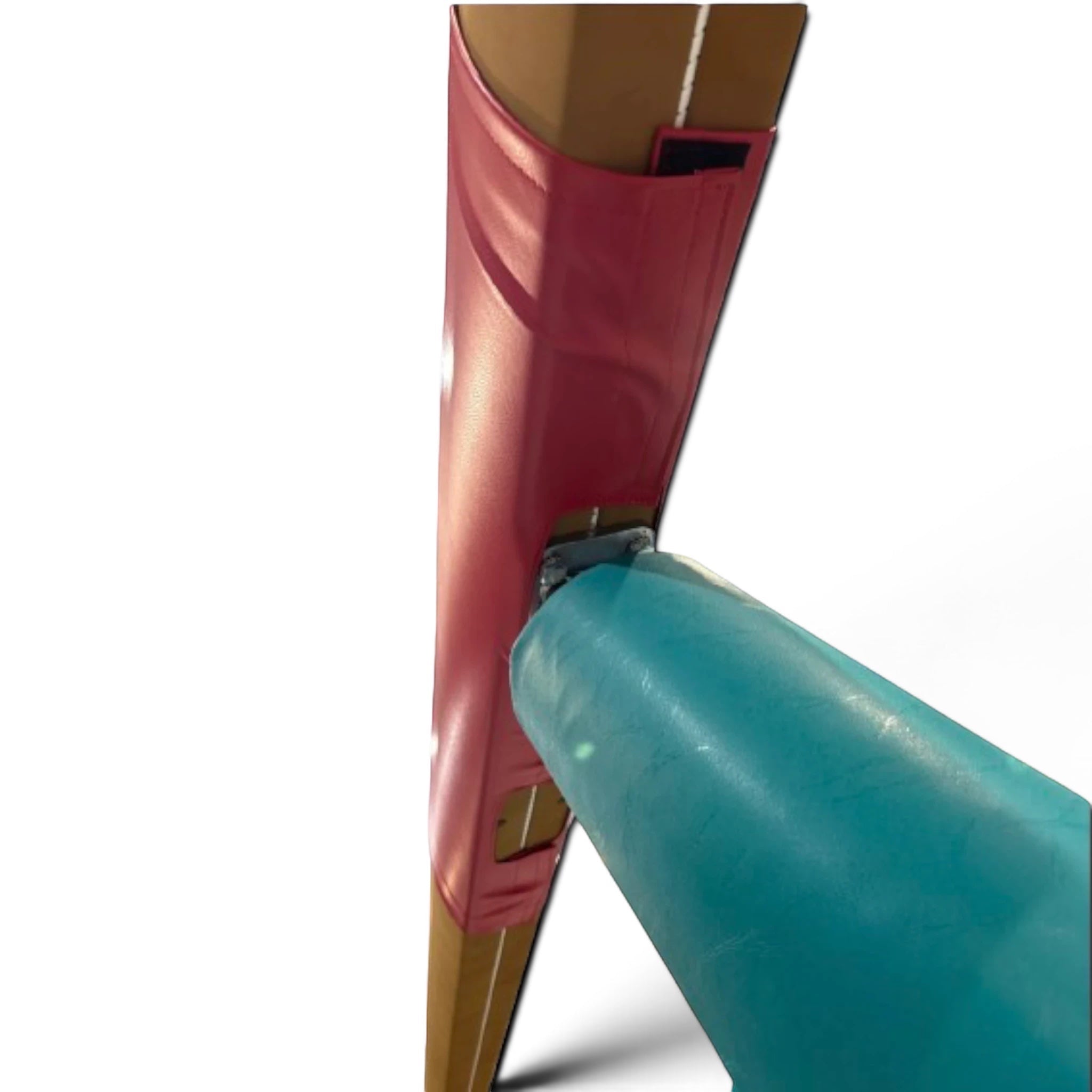 UK Gym Pits cushioned pink mat wrapped around a gymnastics beam for added safety and shock absorption.