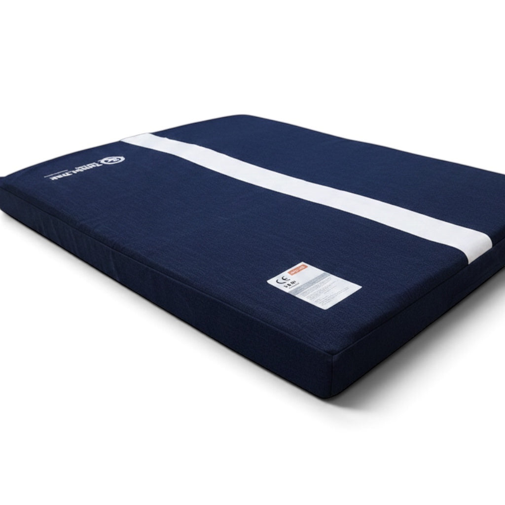 UK Gym Pits soft blue denim gymnastics topper mat with a central white landing line and Velcro base for stability.