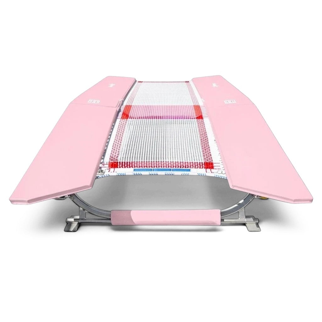 UK Gym Pits double mini tramp with pink frame pads and white web bed, built to FIG specifications.