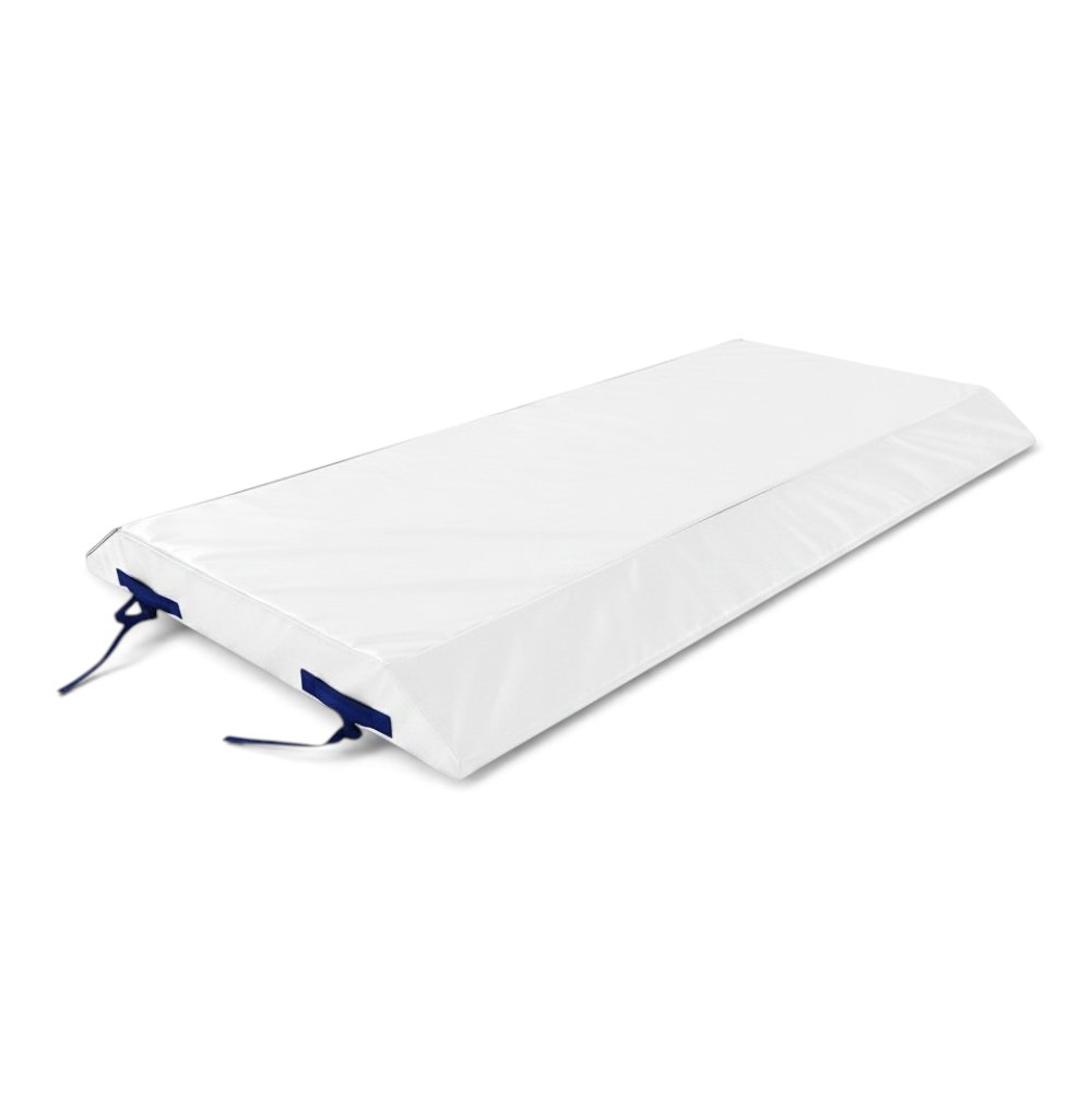UK Gym Pits white double wedge trampoline spotting end deck mat with blue webbing straps and handles.