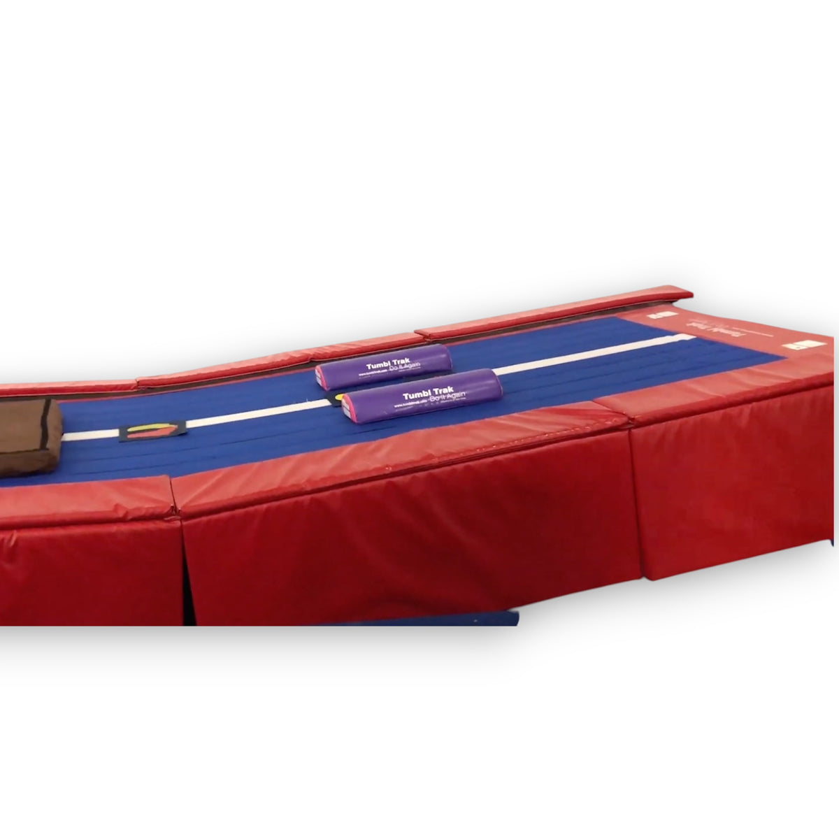 UK Gym Pits Downhill Inclines attachment for Tumbl Trak, featuring red padded sides and a blue tumbling surface.