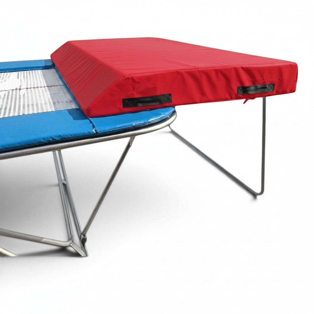 UK Gym Pits economy spotting end deck with a red wedged safety mat attached to a trampoline frame