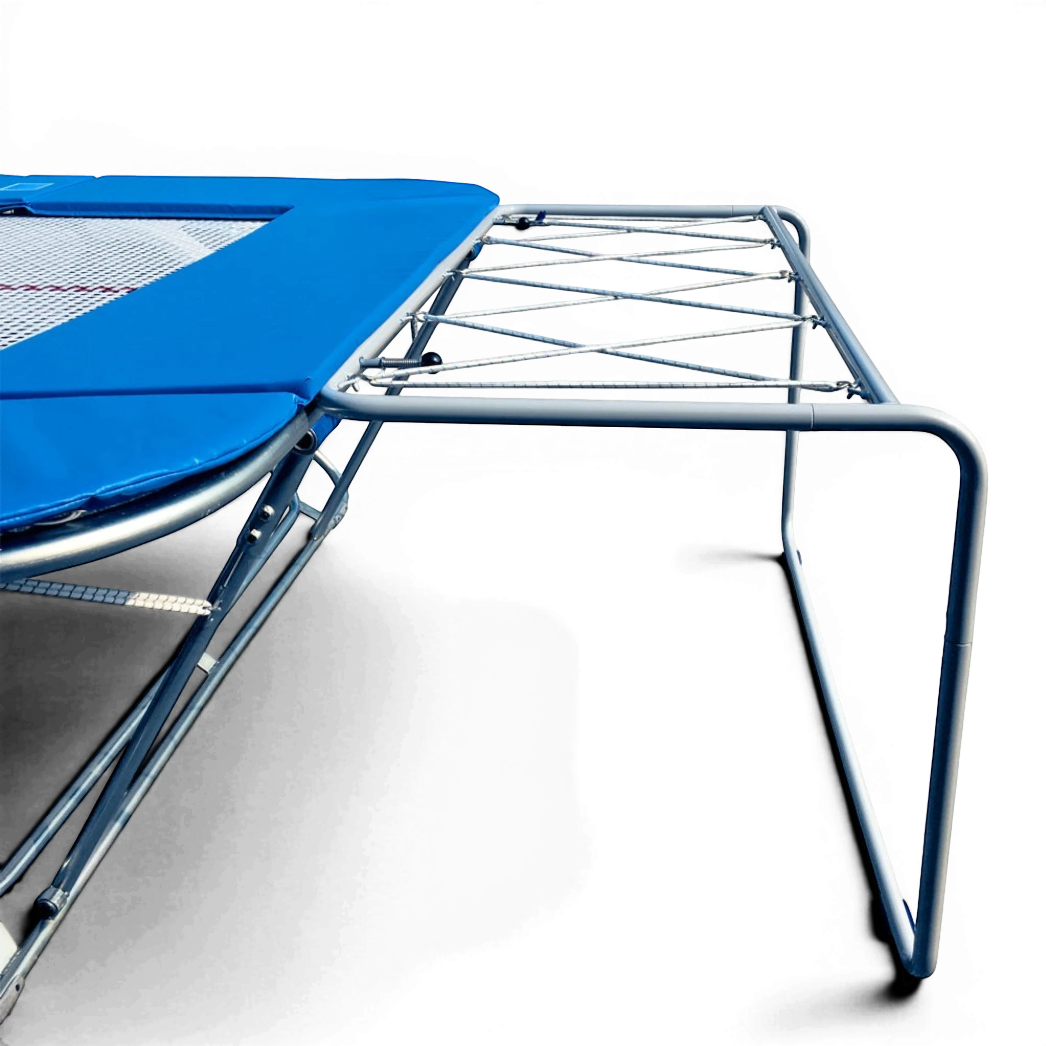 UK Gym Pits economy spotting end deck with silver powder coated frame attached to a blue trampoline