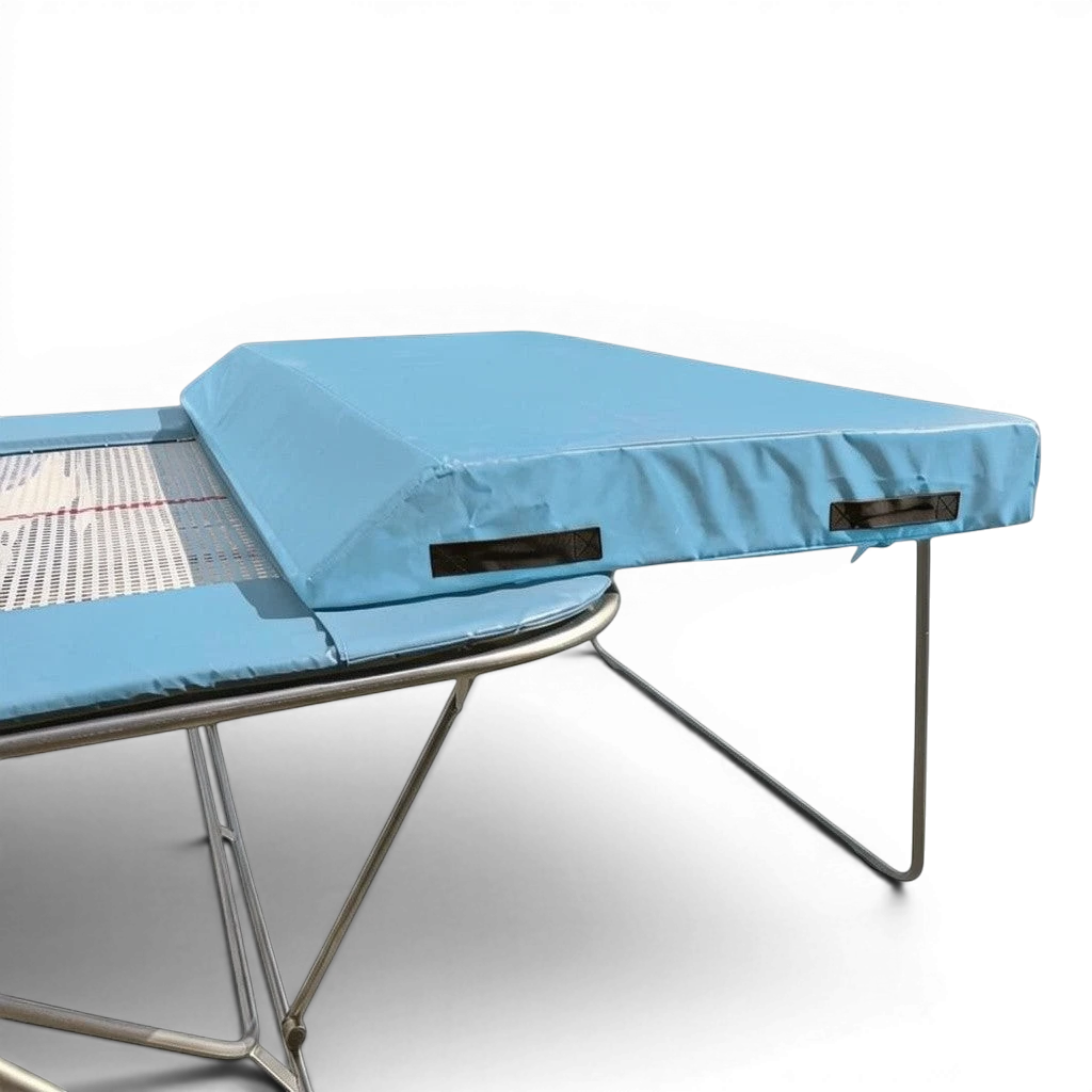 UK Gym Pits economy spotting end deck with light blue safety mat attached to a silver metal trampoline frame