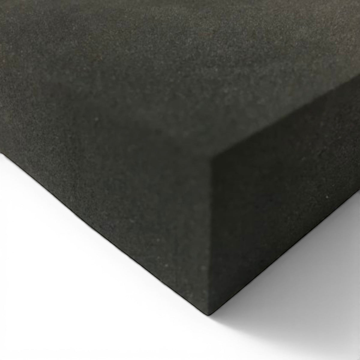 UK Gym Pits black EDPM foam block for sprung tumble floor construction, showing high-density material texture.