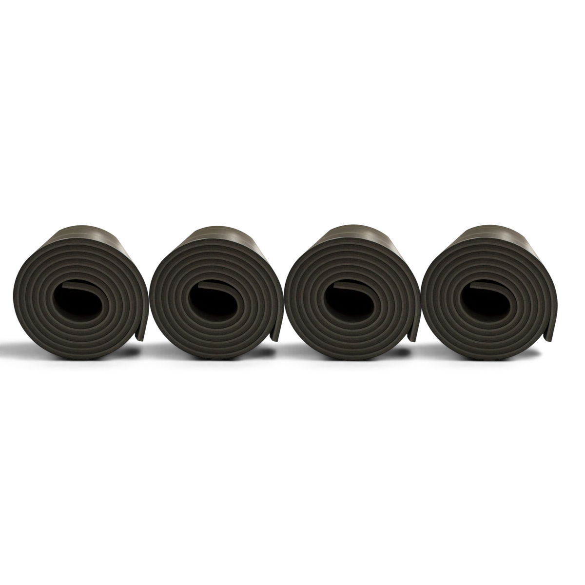Four rolls of UK Gym Pits Fast Foam polyethylene floor padding for gymnastics and cheerleading sprung floors.