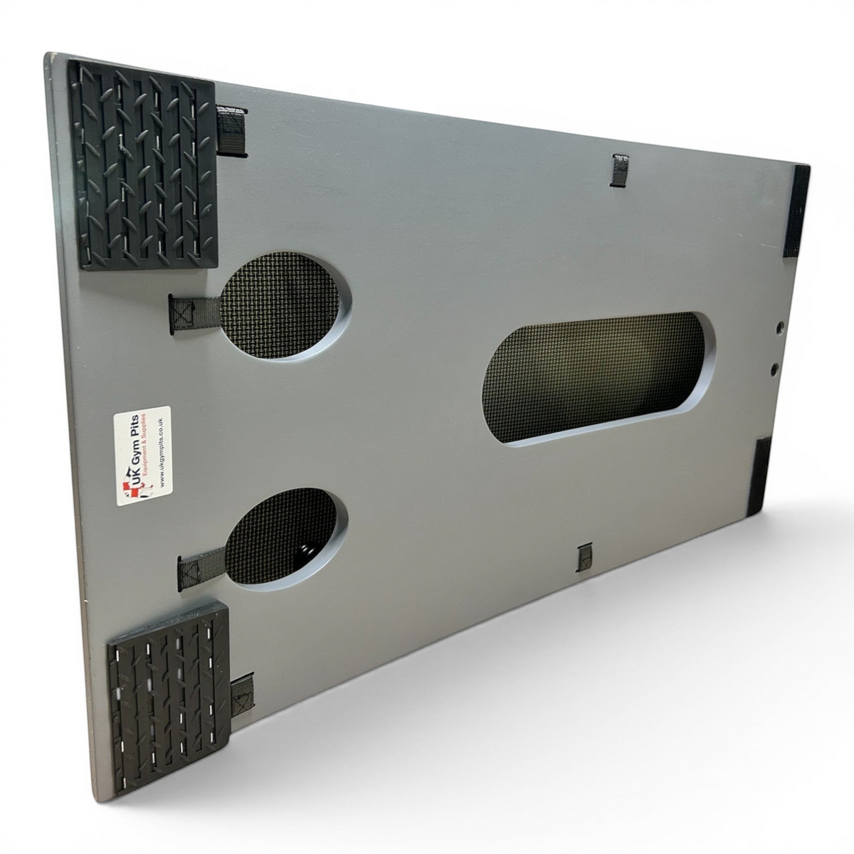UK Gym Pits FIG approved springboard underside view showing plywood base, rubber feet, and ventilation ports.