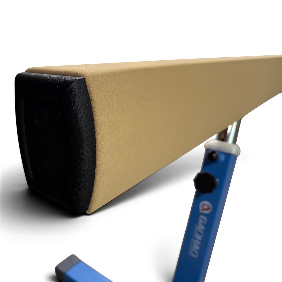 UK Gym Pits FIG approved gymnastics beam with beige anti-slip PU leather surface and blue adjustable steel legs