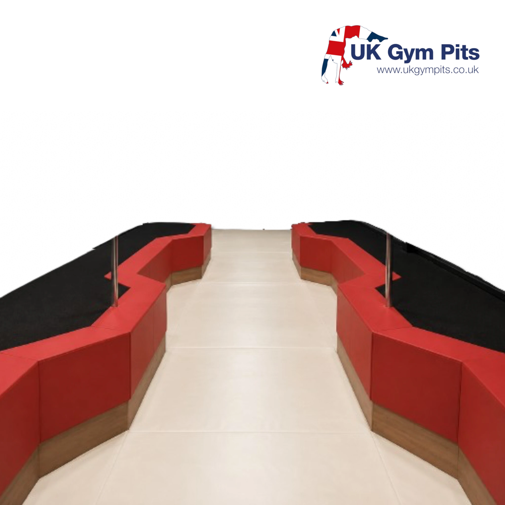 UK Gym Pits foam landing pit base with red padded edges and a smooth beige floor surface for gymnastics facilities
