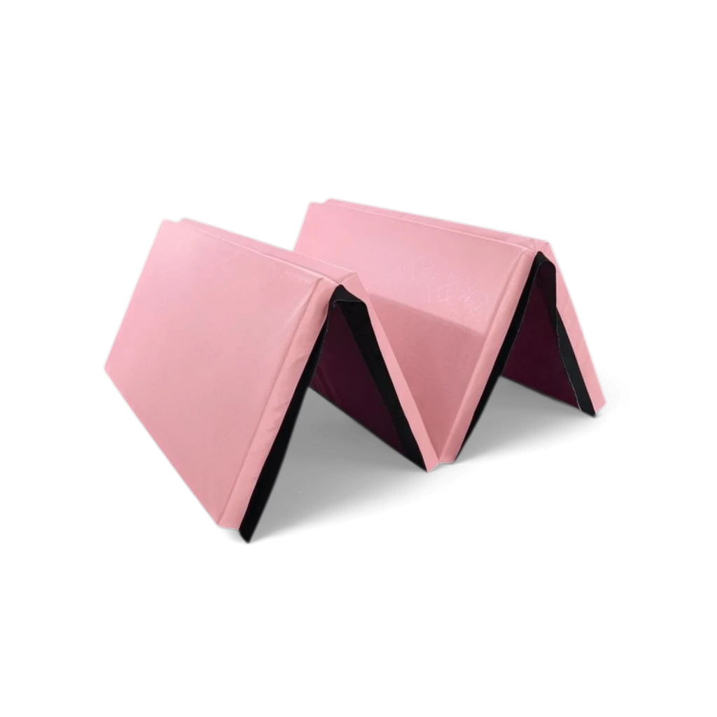 UK Gym Pits foldable pink gymnastics mat made of durable PVC fabric with a convenient carry handle for easy transport