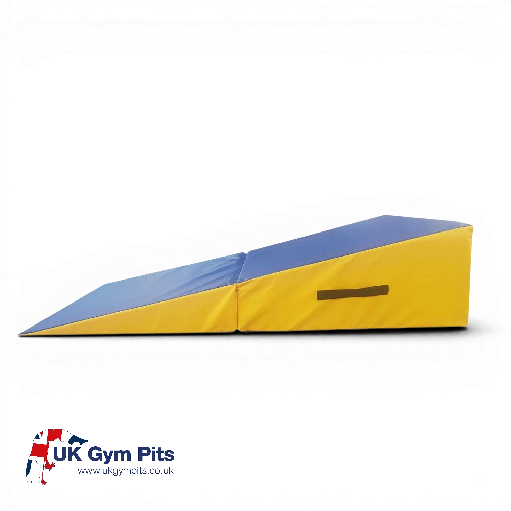 UK Gym Pits folding inclined wedge in blue and yellow vinyl for gymnastics and soft play with side carry handles