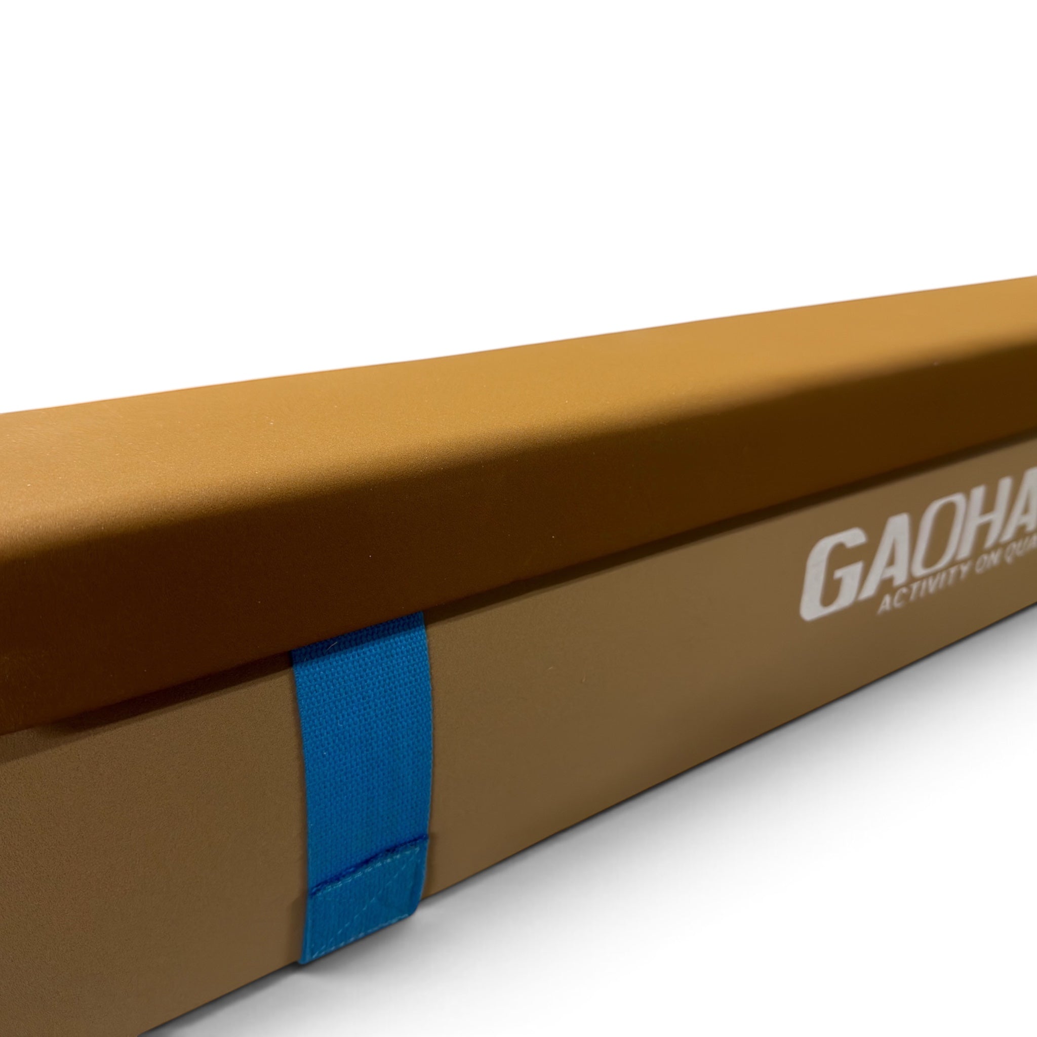 UK Gym Pits Gaofei 3m beam enlarger in tan with a blue Velcro strap for secure attachment to gymnastics beams