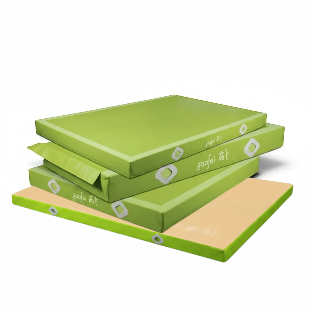 UK Gym Pits Gaofei green gymnastics landing mats stacked, featuring durable PVC vinyl and air distribution mesh.