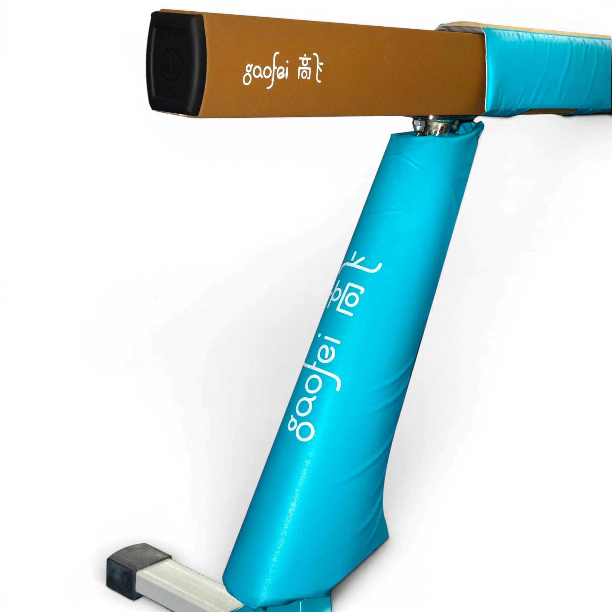 UK Gym Pits Gaofei FIG approved gymnastics beam with blue protective leg padding and brown anti-slip surface