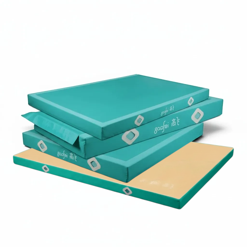 UK Gym Pits Gaofei teal gymnastics landing mats stacked with non-slip base and reinforced corners for safe training