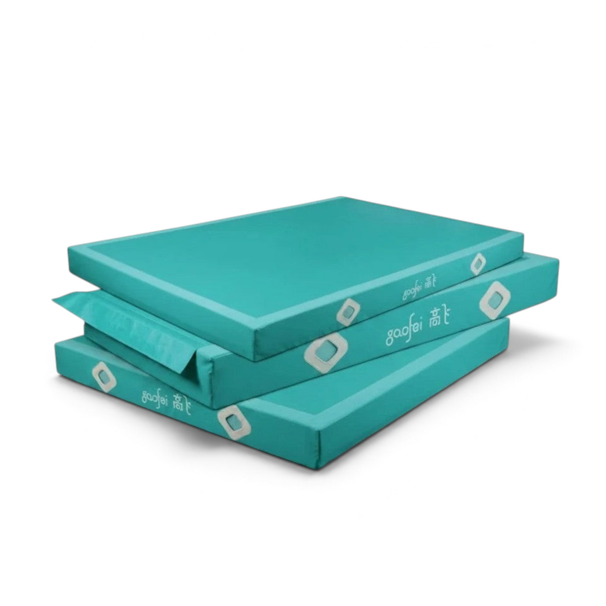 UK Gym Pits Gaofei teal gymnastics landing mats stacked, featuring durable PVC vinyl and air distribution mesh.