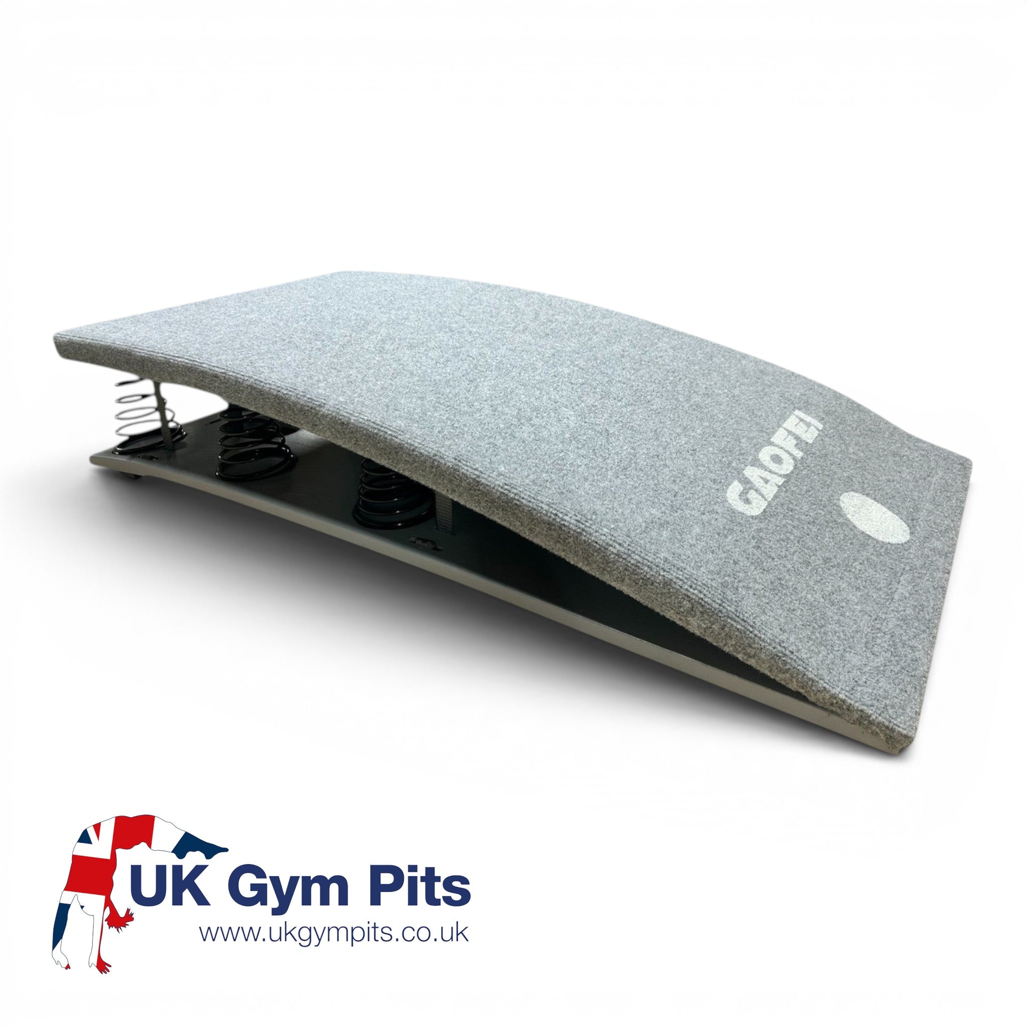 UK Gym Pits Gaofei FIG approved gymnastics springboard with grey carpeted surface and exposed tapered springs