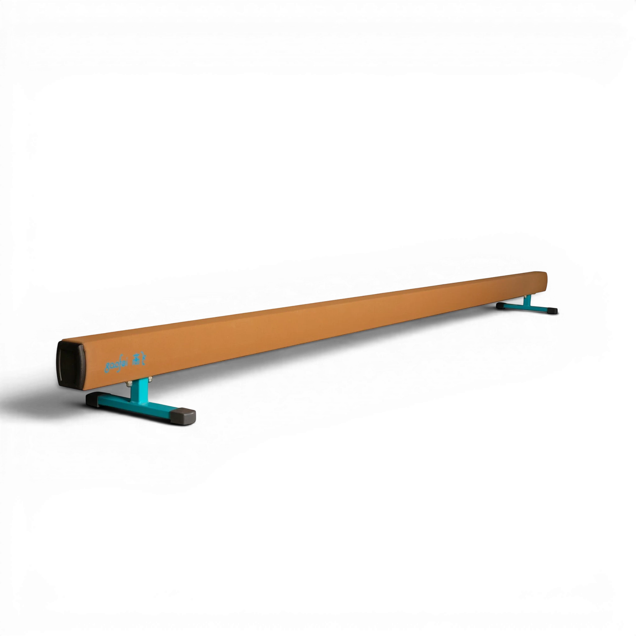 UK Gym Pits Gaofei low gymnastics training beam with tan padded surface and teal steel legs on a black background.