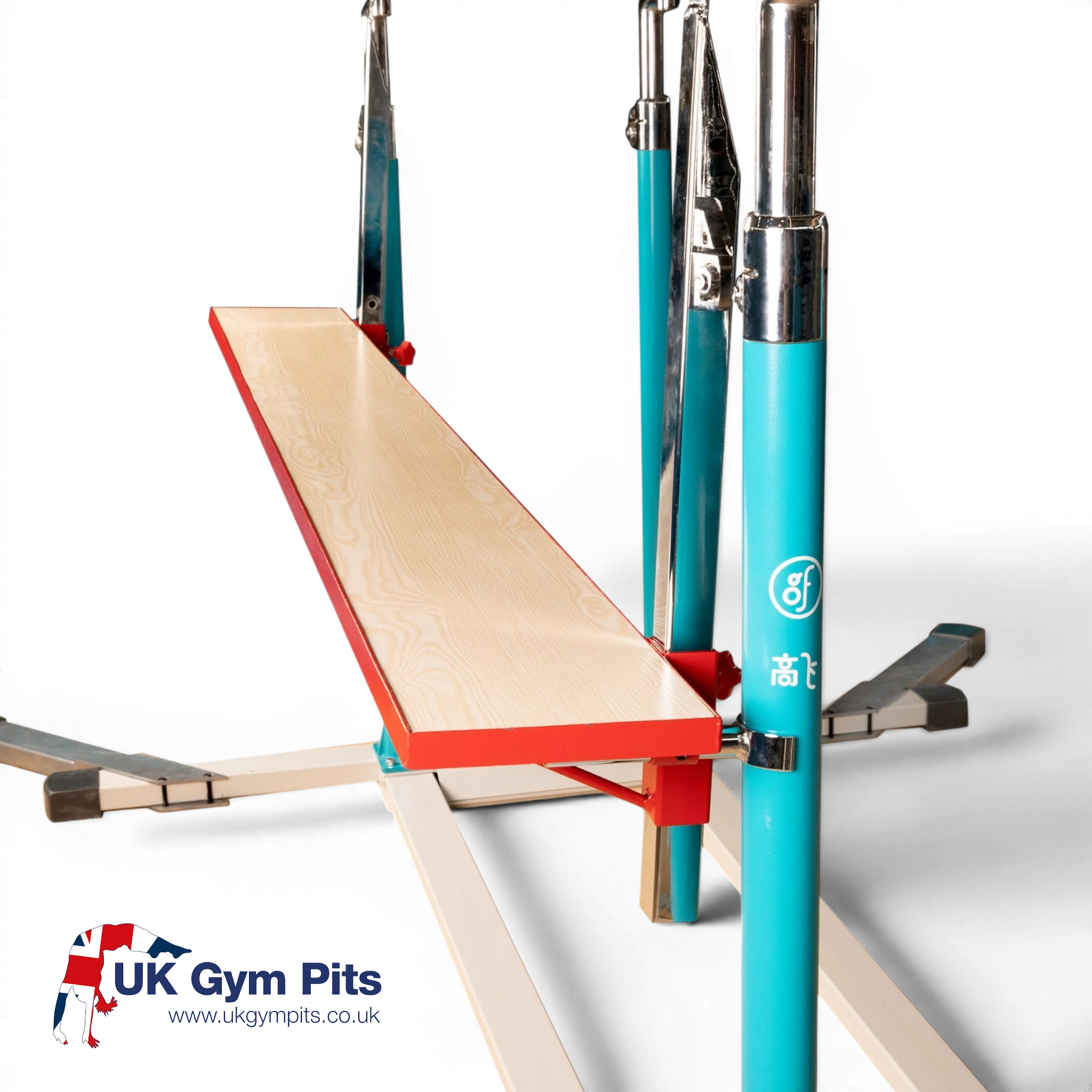 UK Gym Pits Gaofei parallel bars spotting platform with a light wood surface and red trim on a blue steel frame.