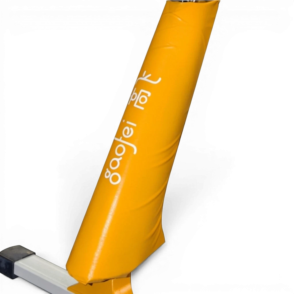 UK Gym Pits Gaofei yellow PVC vinyl safety padding wrapped around a pommel horse leg for gymnastics protection.