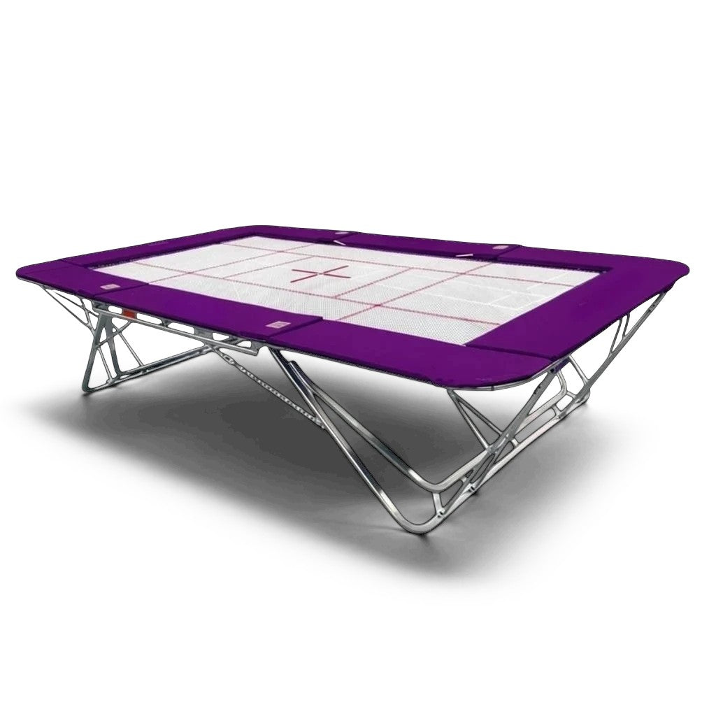 UK Gym Pits GM Extreme competition trampoline with a white 4mm by 6mm web bed and purple protective frame pads.