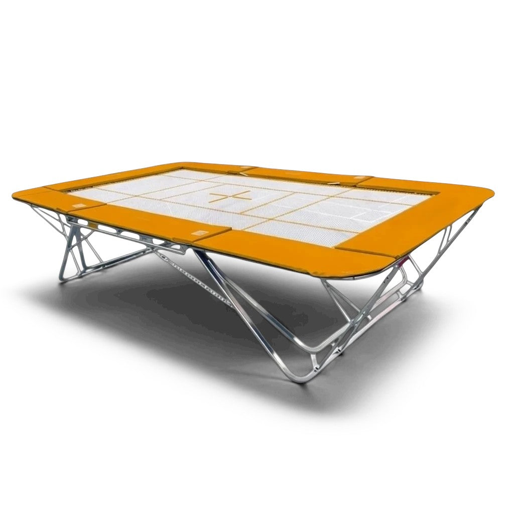 UK Gym Pits GM Extreme competition trampoline with a 4mm by 6mm web bed and orange protective frame pads.