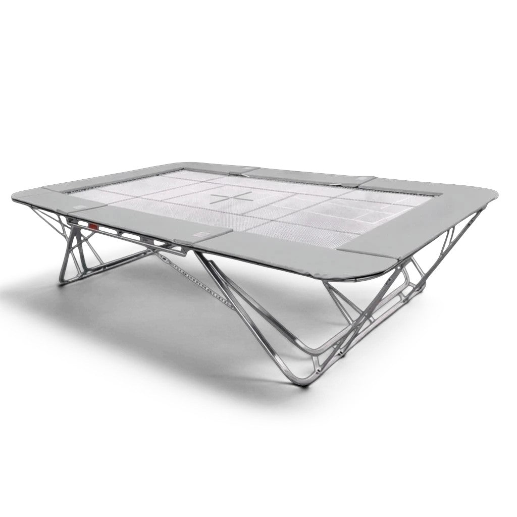 UK Gym Pits GM Extreme competition trampoline with a 4mm by 6mm web bed and grey protective frame pads