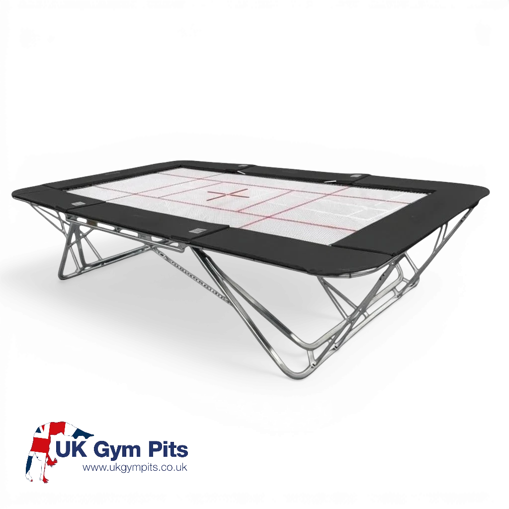 UK Gym Pits GM Extreme competition trampoline with a white 4mm by 6mm web bed and black protective frame pads