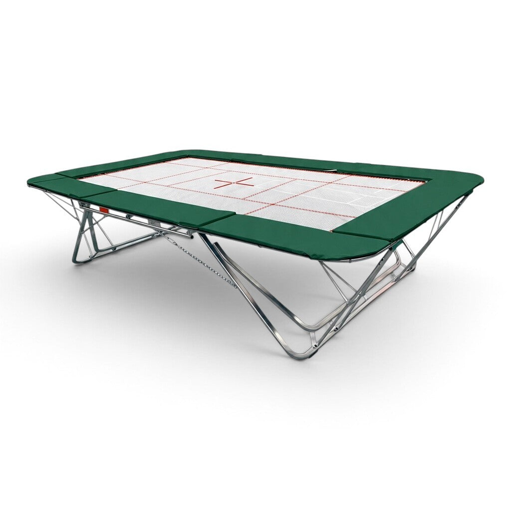 UK Gym Pits GMEX Extreme competition trampoline with green frame pads and a white web bed on a white background
