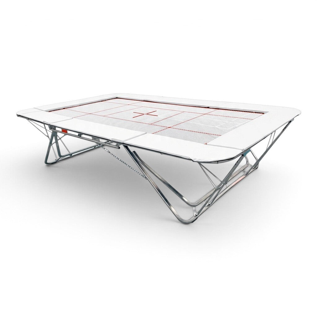 UK Gym Pits GMEX Extreme competition trampoline with white web bed and protective frame pads on a steel frame