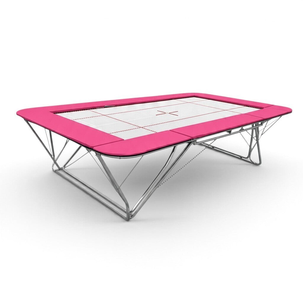 UK Gym Pits GMEX Extreme competition trampoline with a white web bed and vibrant pink protective frame pads.