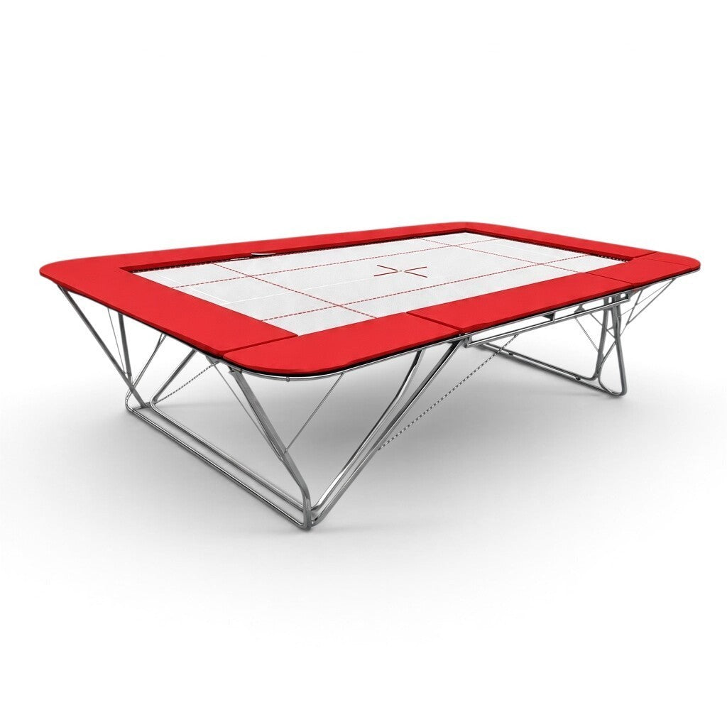 UK Gym Pits GMEX Extreme competition trampoline with a white web bed and red protective frame pads on a white background