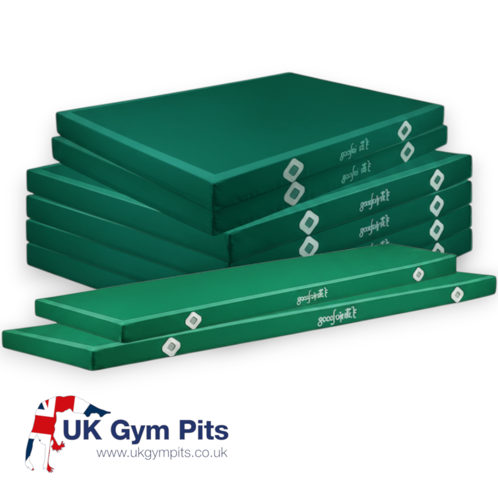 UK Gym Pits green parallel bars landing mats with non-slip base and Velcro locking system for gymnastics training.